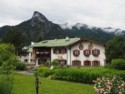 A guesthouse with mountains in the background